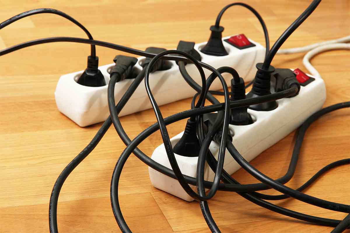 power strips with lots of cords plugged into them