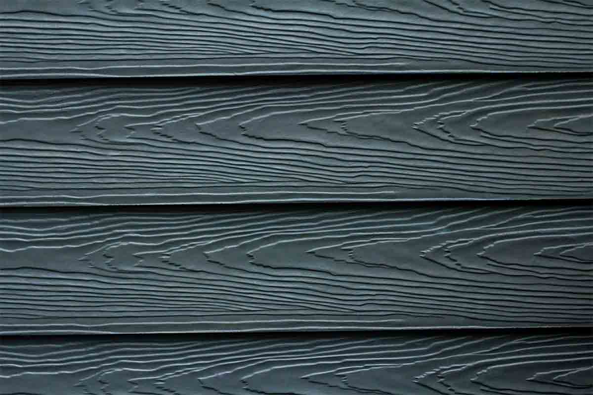 close-up of dark blue fiber cement siding