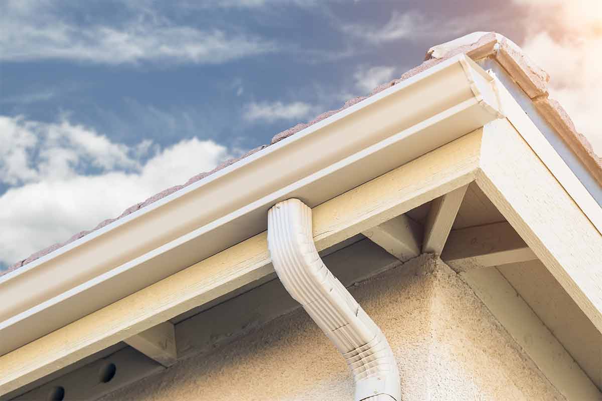 house with white seamless aluminum gutters