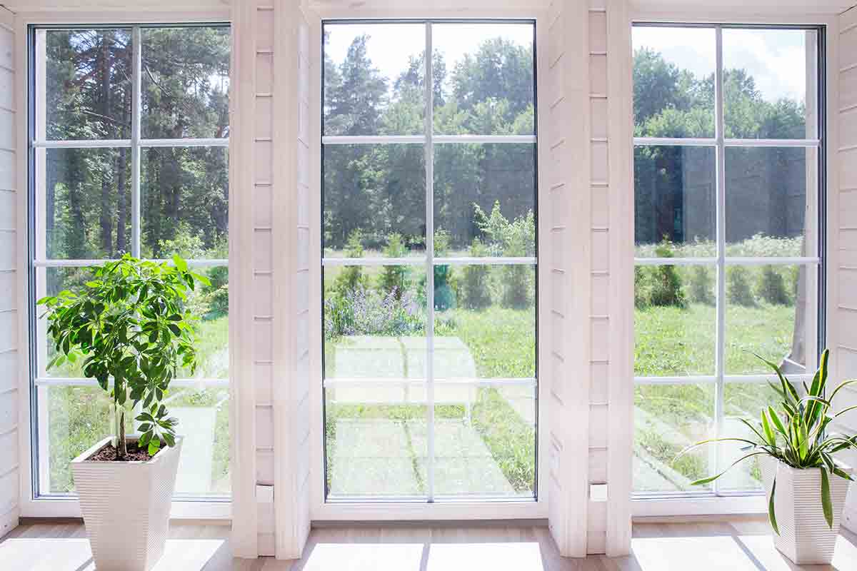 bright room with floor-to-ceiling windows