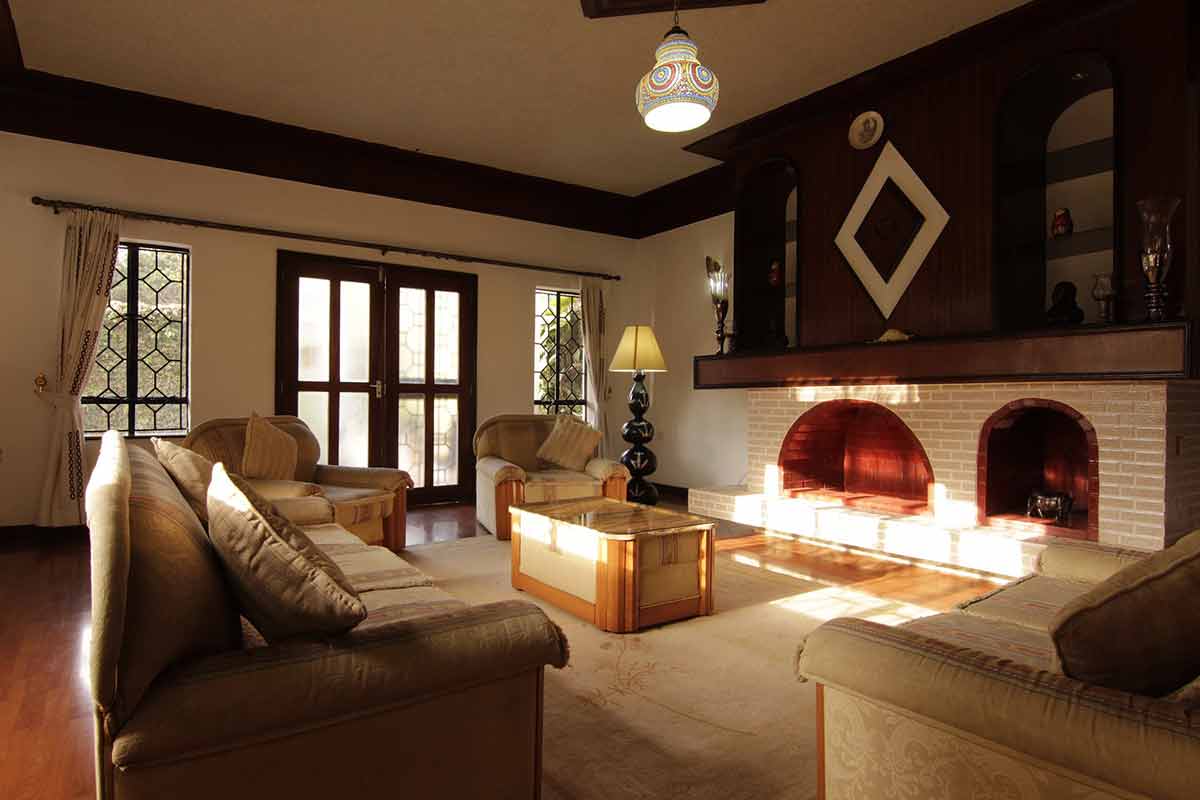 vintage living room with brick fireplace