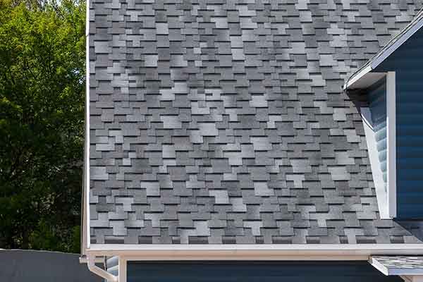 roof of house with new bitumen shingles