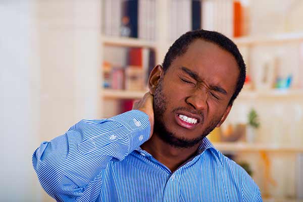 close-up of man with neck pain