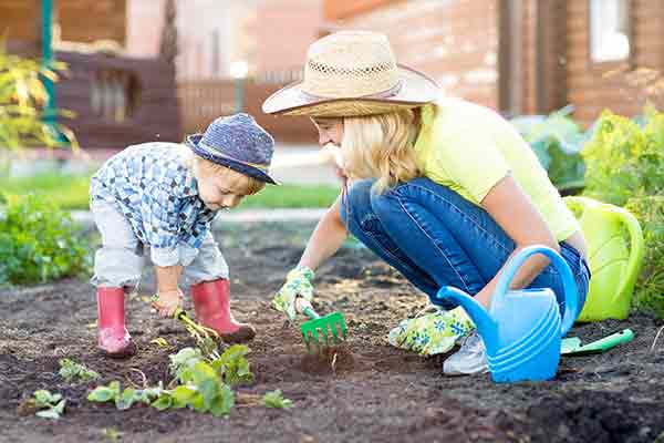 mother and son gardening