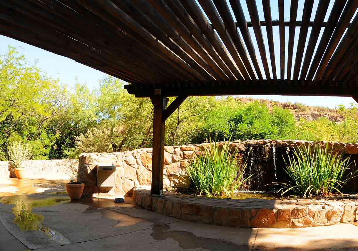 Southwestern-style patio with fountain and plants