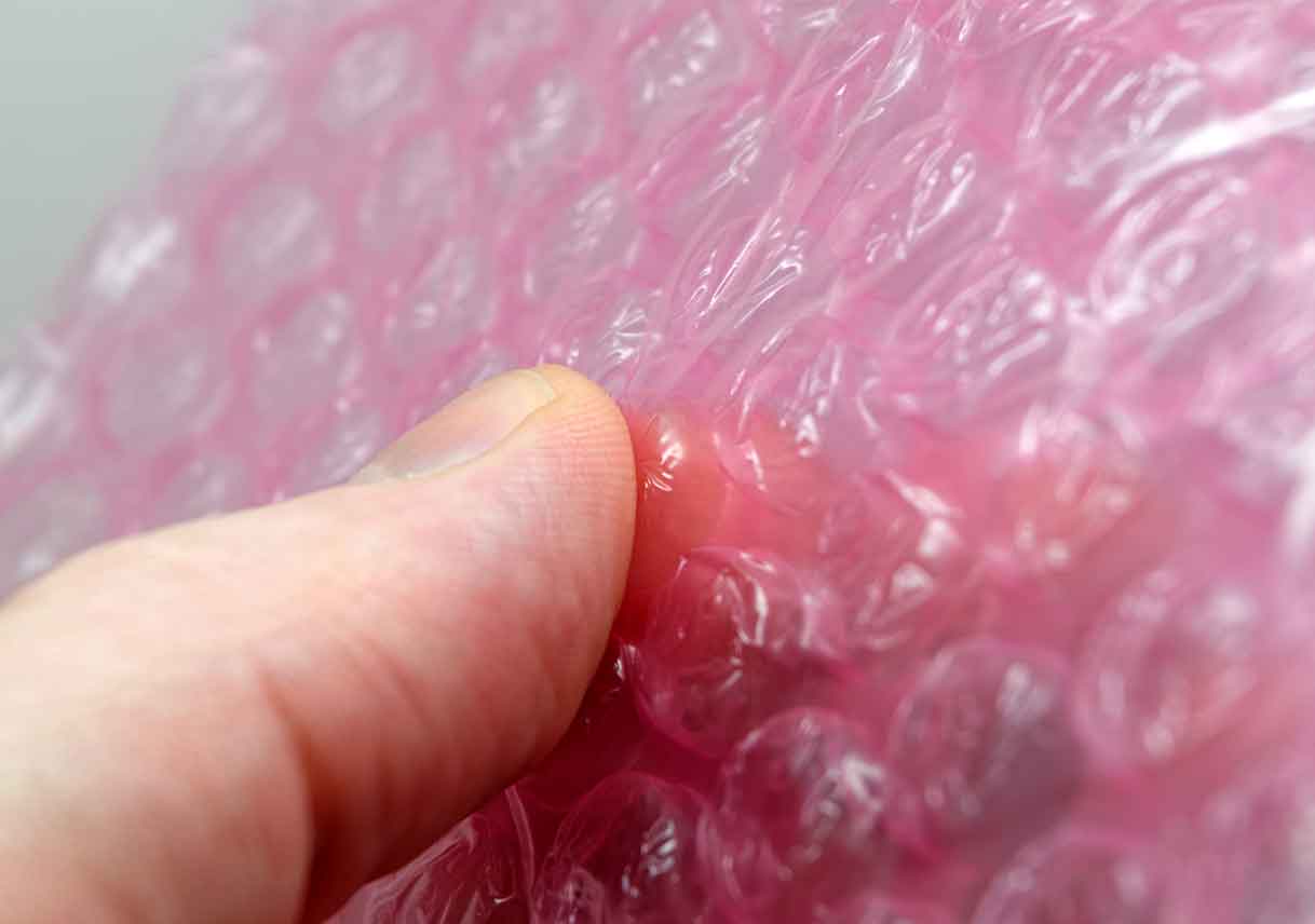 thumb popping bubble wrap