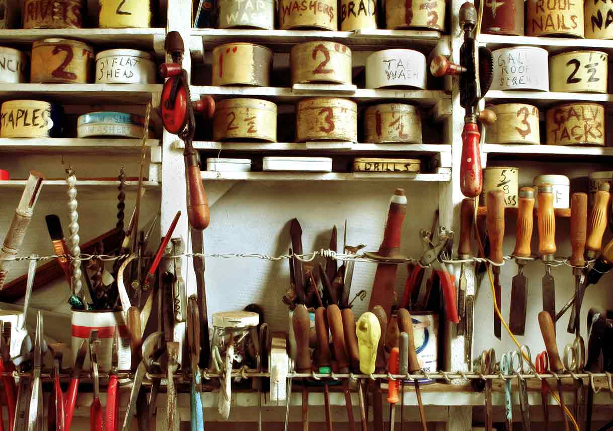 labeled tins of screws and nails