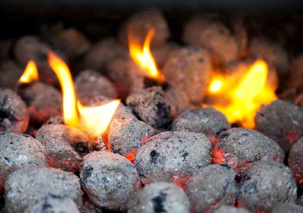 charcoal briquettes on fire