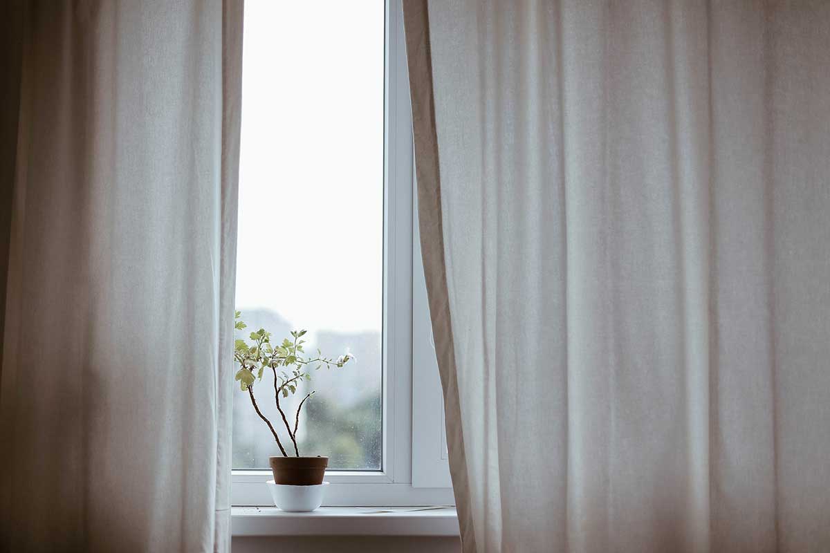 window covered by privacy curtain