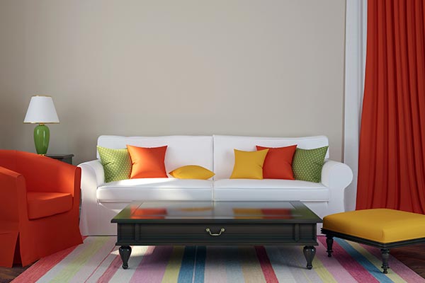 a colorful living room of green, yellow, and red