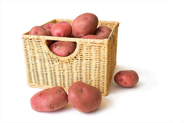 red potatoes in wicker basket