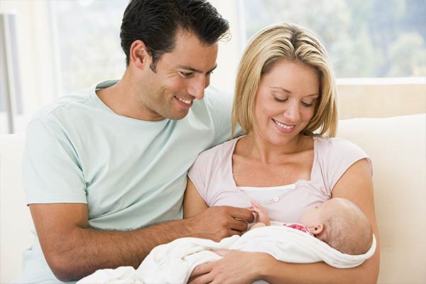 young couple with new baby