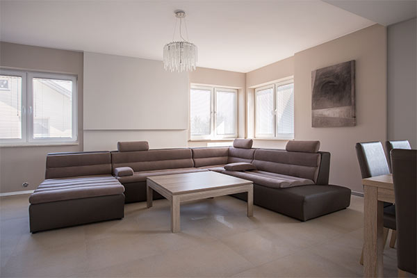 living room with matched gray modern furniture