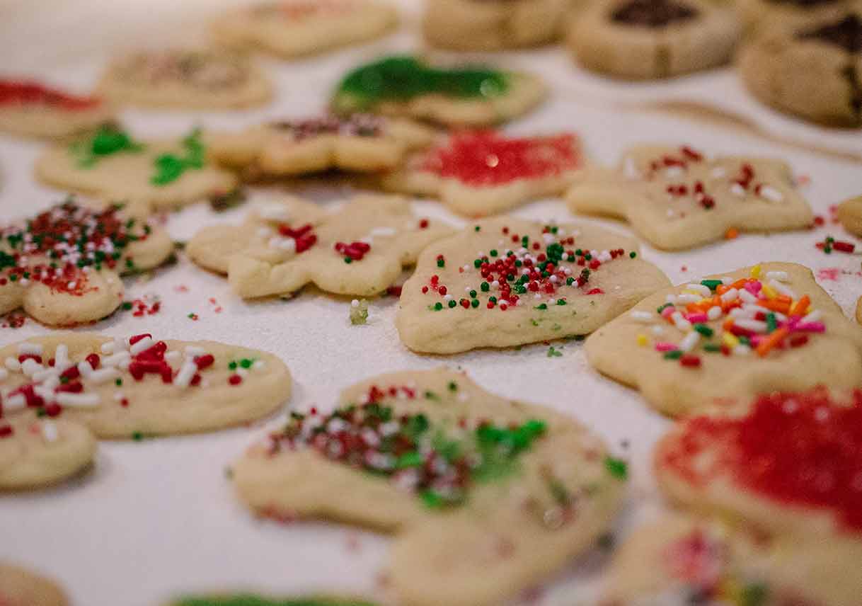 decorated sugar cookies in Christmas shapes