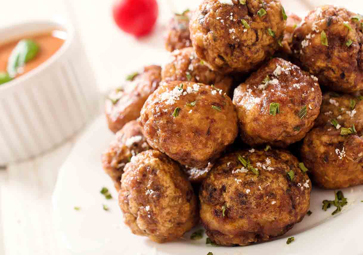 meatballs piled on white plate