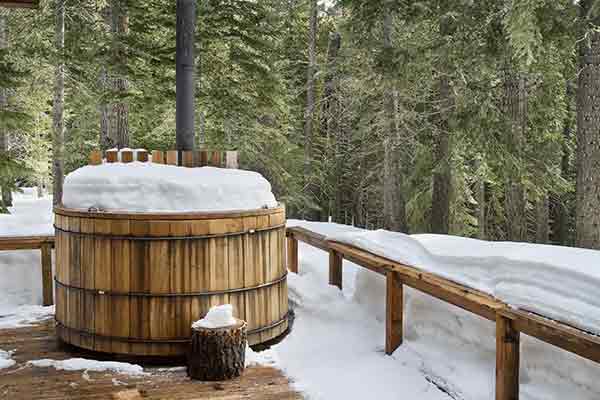 A hot tub frozen over in the cold