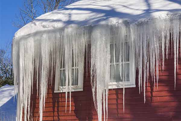 roof with snow and icicles