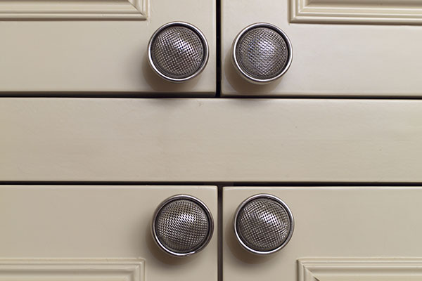 close-up photo of cabinet door handles